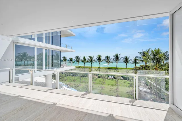 a view of a house with backyard from balcony