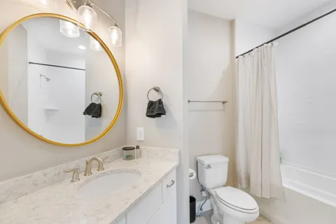 a living room with furniture and windows