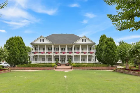 a view of a building with a garden