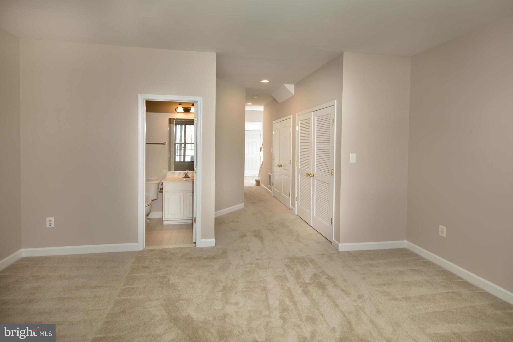 42535 Magellan Square Ashburn, VA 20148 - Photo 6 of 30 Entry Level Family Room w/ Full Bath