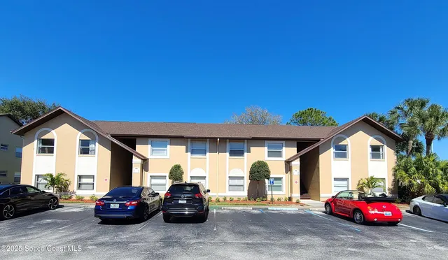 a car parked in front of a house