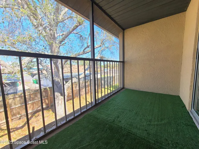 a view of swimming pool with a yard