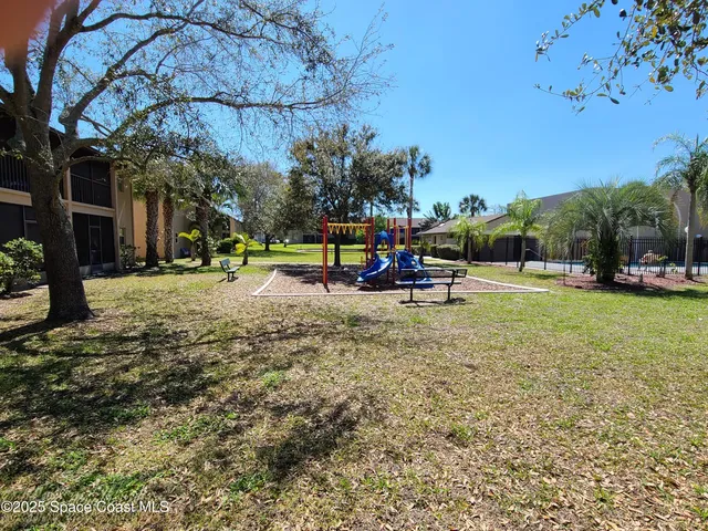 a view of a garden with a slide
