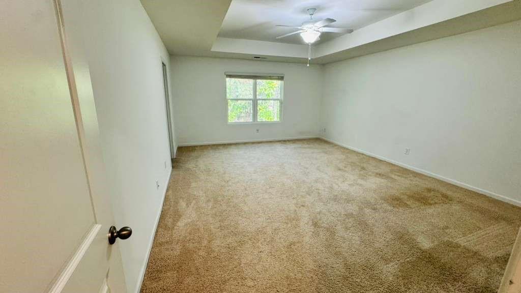4078 Haleston Road Duluth, GA 30097 - Photo 12 of 25 an empty room with a window