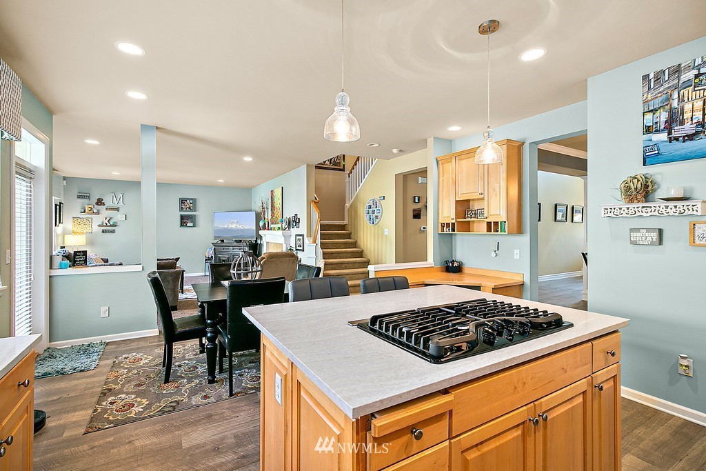 16718 Southeast 165th Way Renton, WA 98058 - Photo 14 of 40 a kitchen with a table and chairs in it