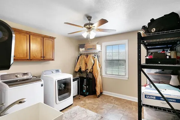 a view of room with washer and dryer