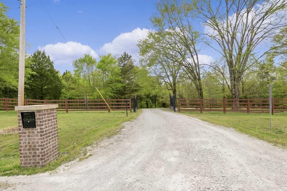138 Herbert Neal Road Milan, TN 38358 - Photo 19 of 19 a view of a backyard