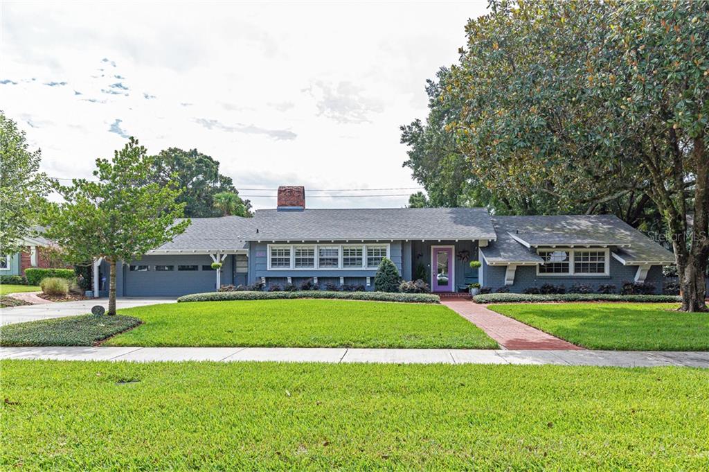 2423 Norfolk Road Orlando, FL 32803 - Photo 1 of 1 a view of a house with swimming pool and yard