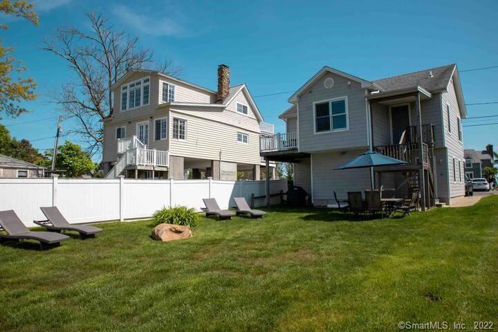 10 Grove Way, Unit 10 Clinton, CT 06413 - Photo 16 of 21 a view of a house with a yard