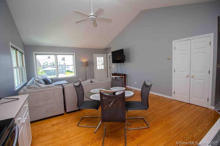 10 Grove Way, Unit 10 Clinton, CT 06413 - Photo 6 of 21 a workspace with furniture window and wooden floor