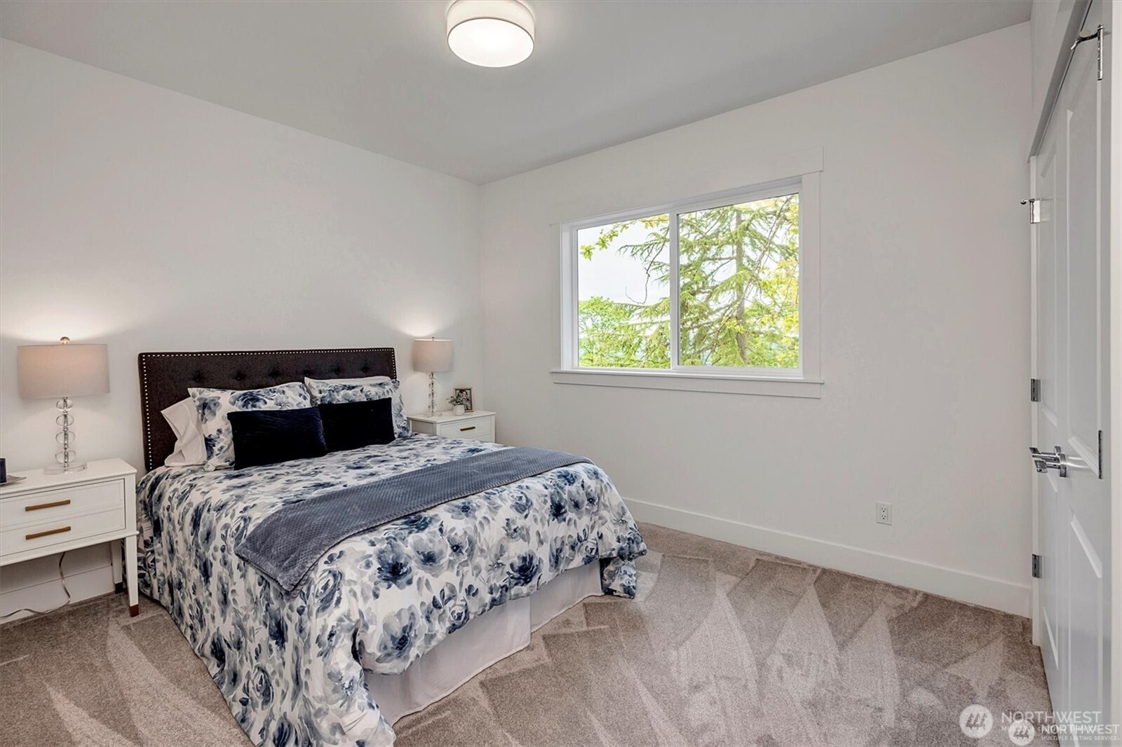 10645 Southeast 170th Pl-lot 11 Renton, WA 98055 - Photo 21 of 29 a bedroom with a bed and a window