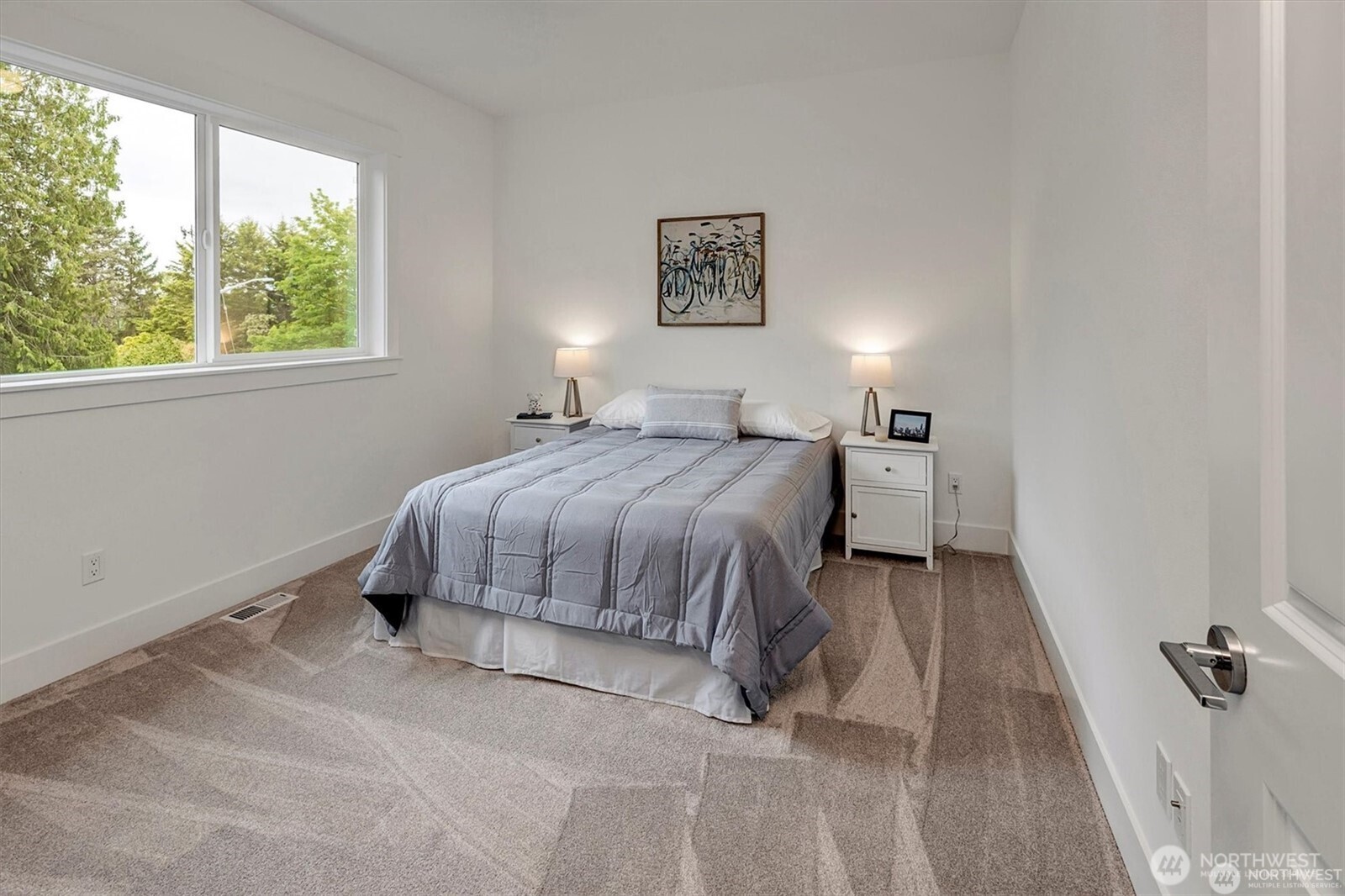 10645 Southeast 170th Pl-lot 11 Renton, WA 98055 - Photo 22 of 29 a bedroom with a bed lamp and window