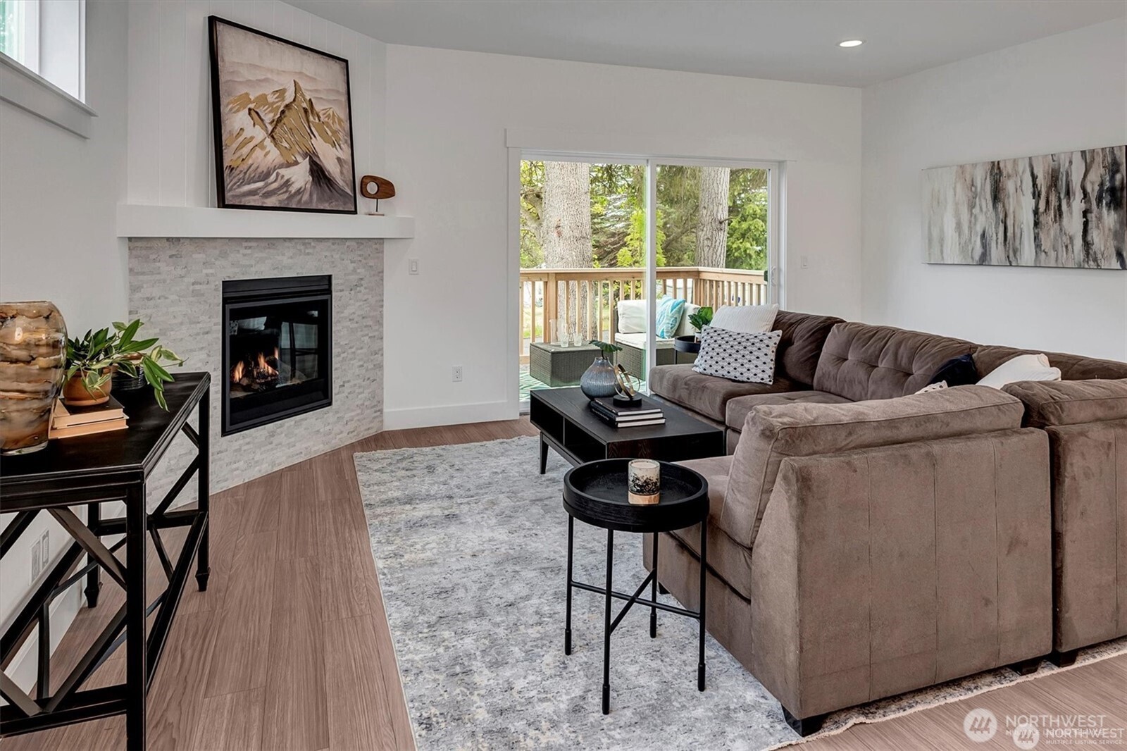 10645 Southeast 170th Pl-lot 11 Renton, WA 98055 - Photo 6 of 29 a living room with furniture a window and a fireplace