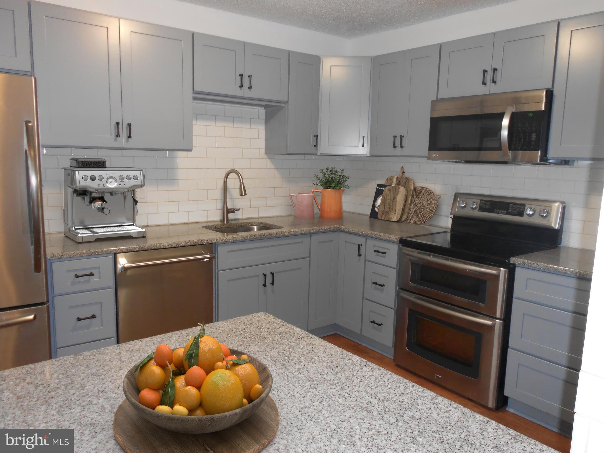 205 East Joppa Road, Unit 2405 Baltimore, MD 21286 - Photo 4 of 57 Updated Kitchen with Ample Cabinetry