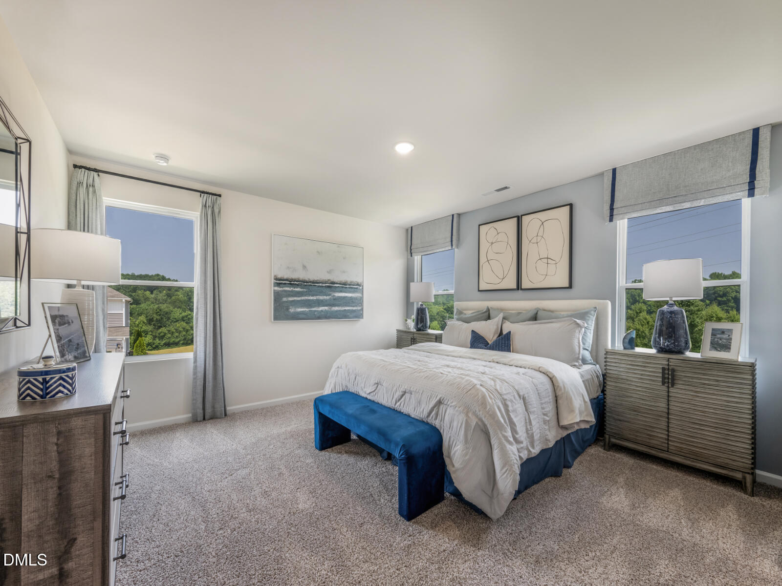 1511 Hatteras Road Durham, NC 27703 - Photo 10 of 12 a bedroom with a bed table and window
