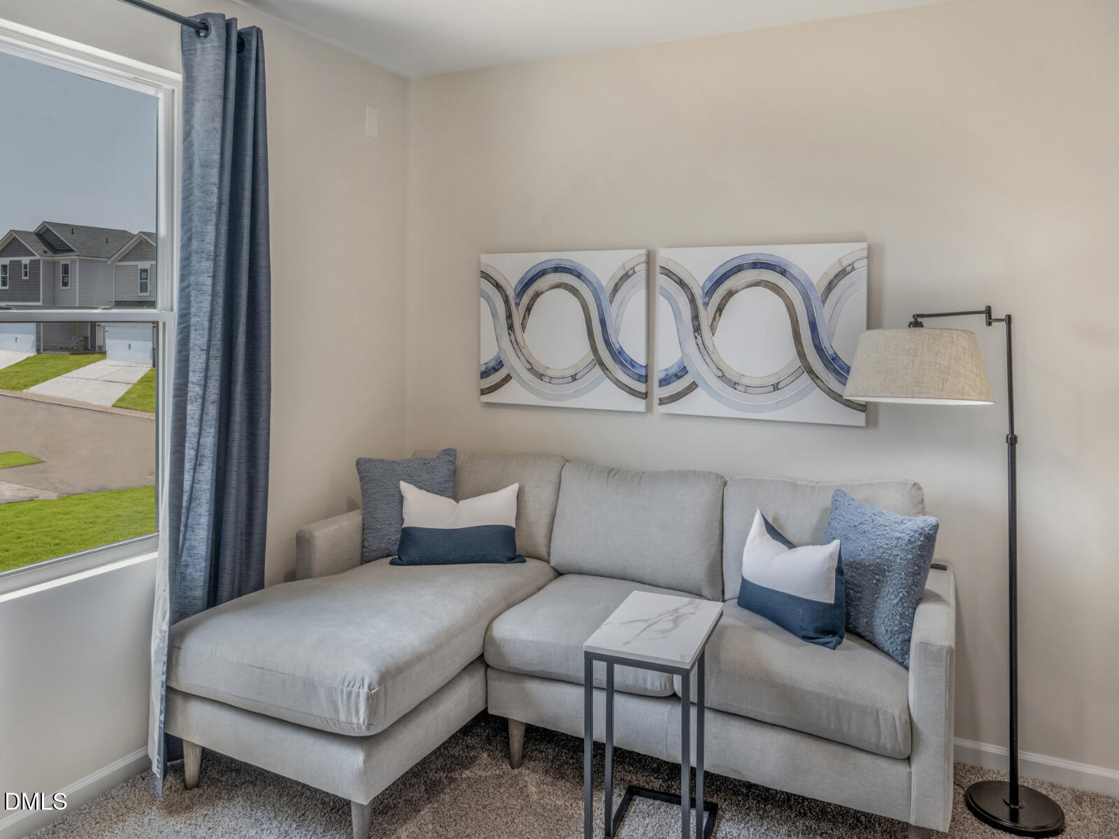1511 Hatteras Road Durham, NC 27703 - Photo 7 of 12 a living room with furniture and a large window