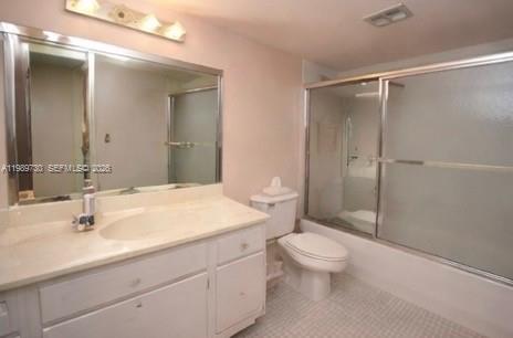 3531 Inverrary Drive, Unit 310 Lauderhill, FL 33319 - Photo 7 of 10 a bathroom with a sink toilet and shower