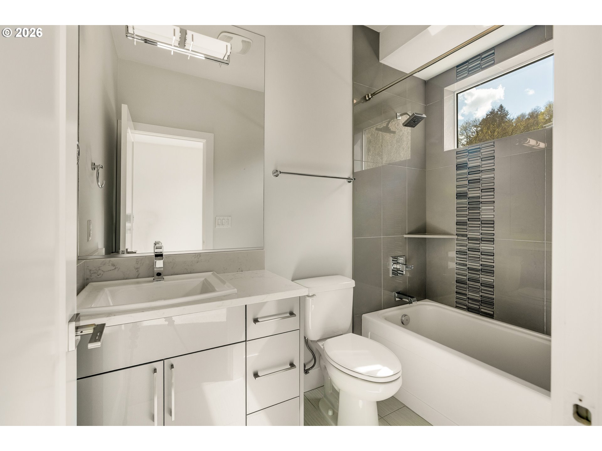 1625 Southwest Montgomery Street, Unit C Portland, OR 97201 - Photo 24 of 44 a bathroom with a sink a toilet and shower