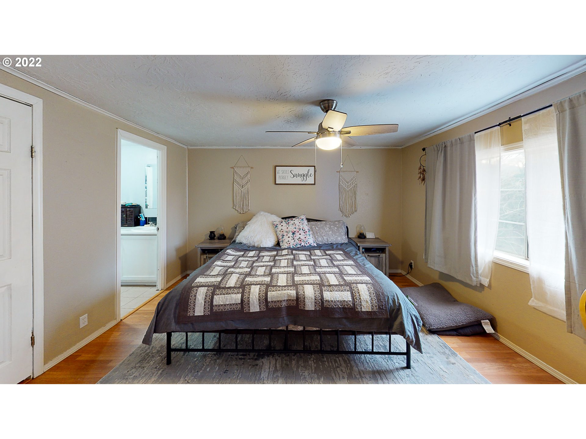 377 P G Sweet Road Kelso, WA 98626 - Photo 16 of 29 a bedroom with a bed and a window