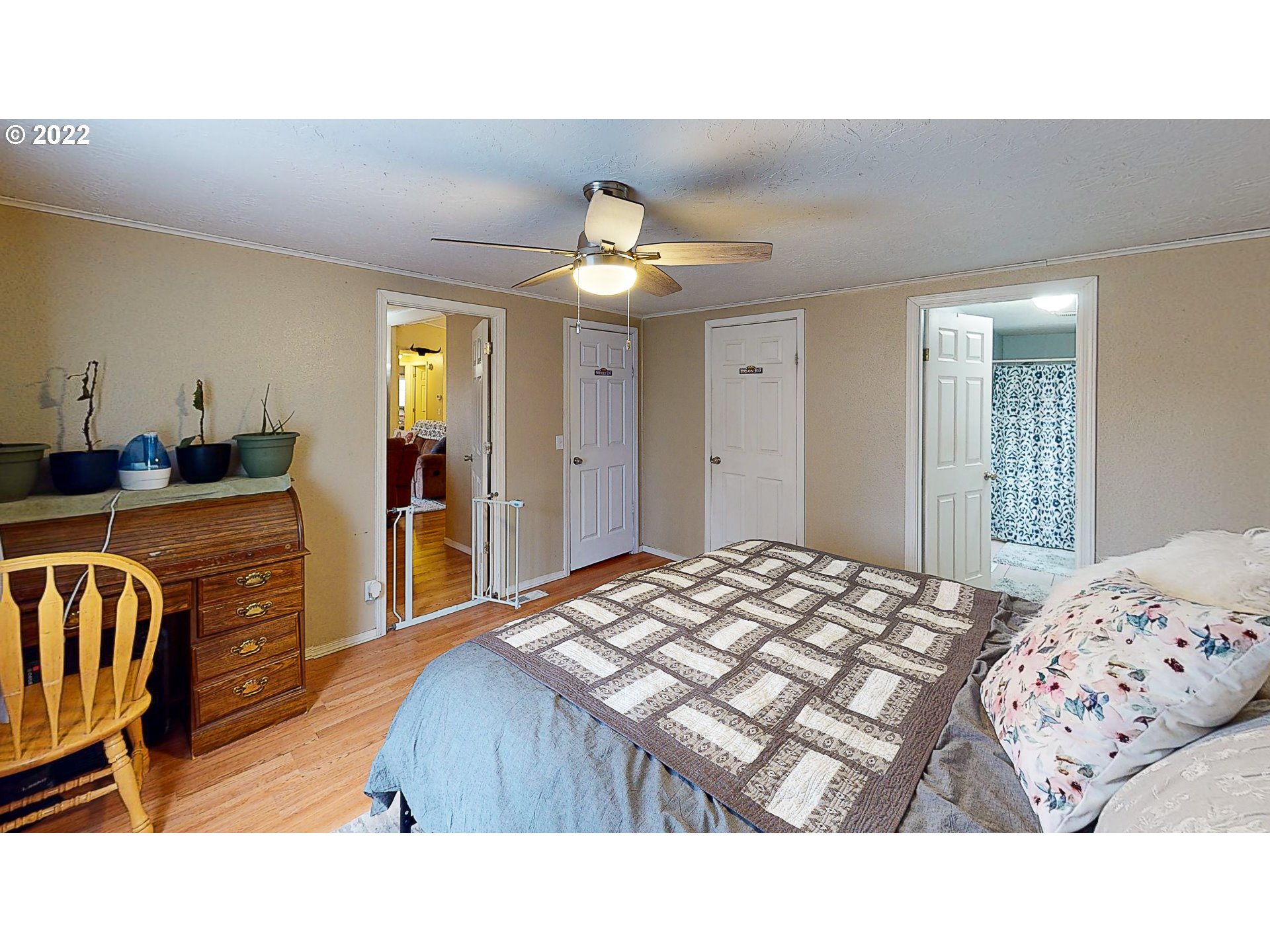 377 P G Sweet Road Kelso, WA 98626 - Photo 17 of 29 a bedroom with a bed and a dresser in it