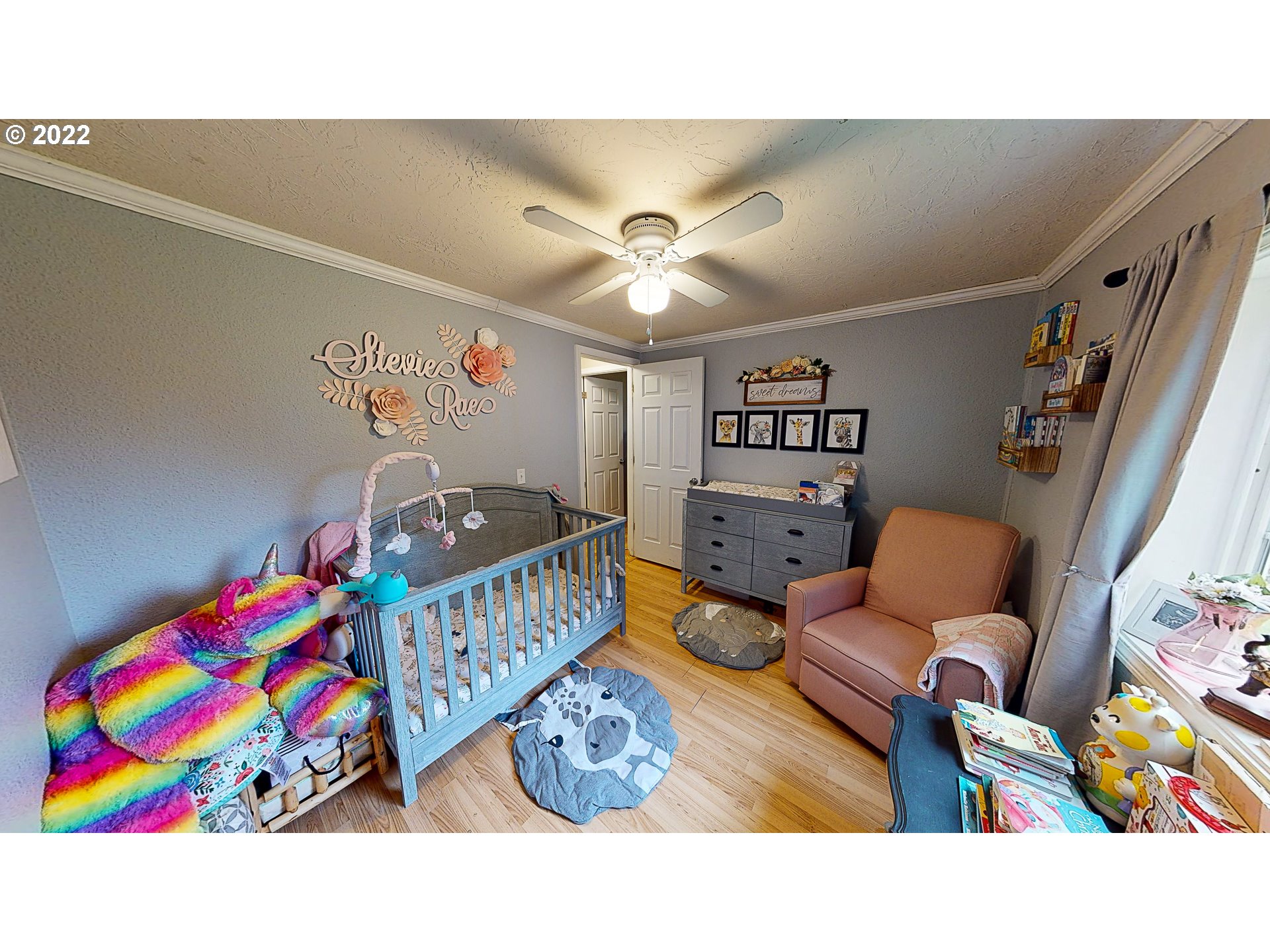 377 P G Sweet Road Kelso, WA 98626 - Photo 26 of 29 a bedroom with furniture and a wooden floor