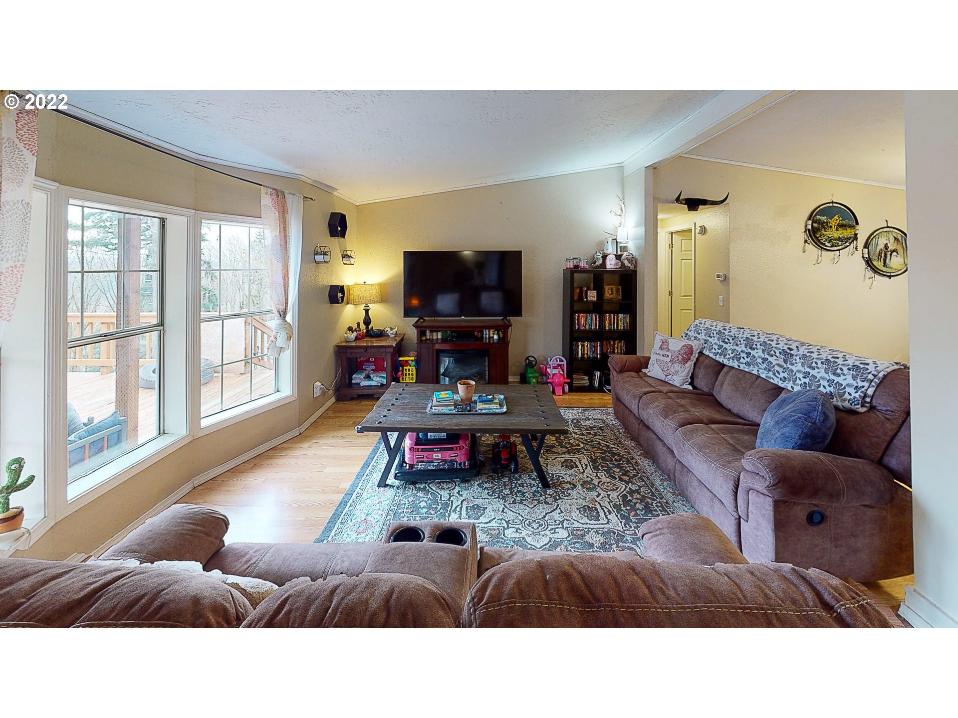 377 P G Sweet Road Kelso, WA 98626 - Photo 8 of 29 a living room with furniture and a flat screen tv