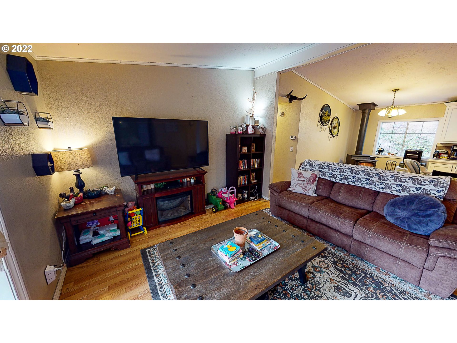 377 P G Sweet Road Kelso, WA 98626 - Photo 9 of 29 a living room with furniture and a flat screen tv