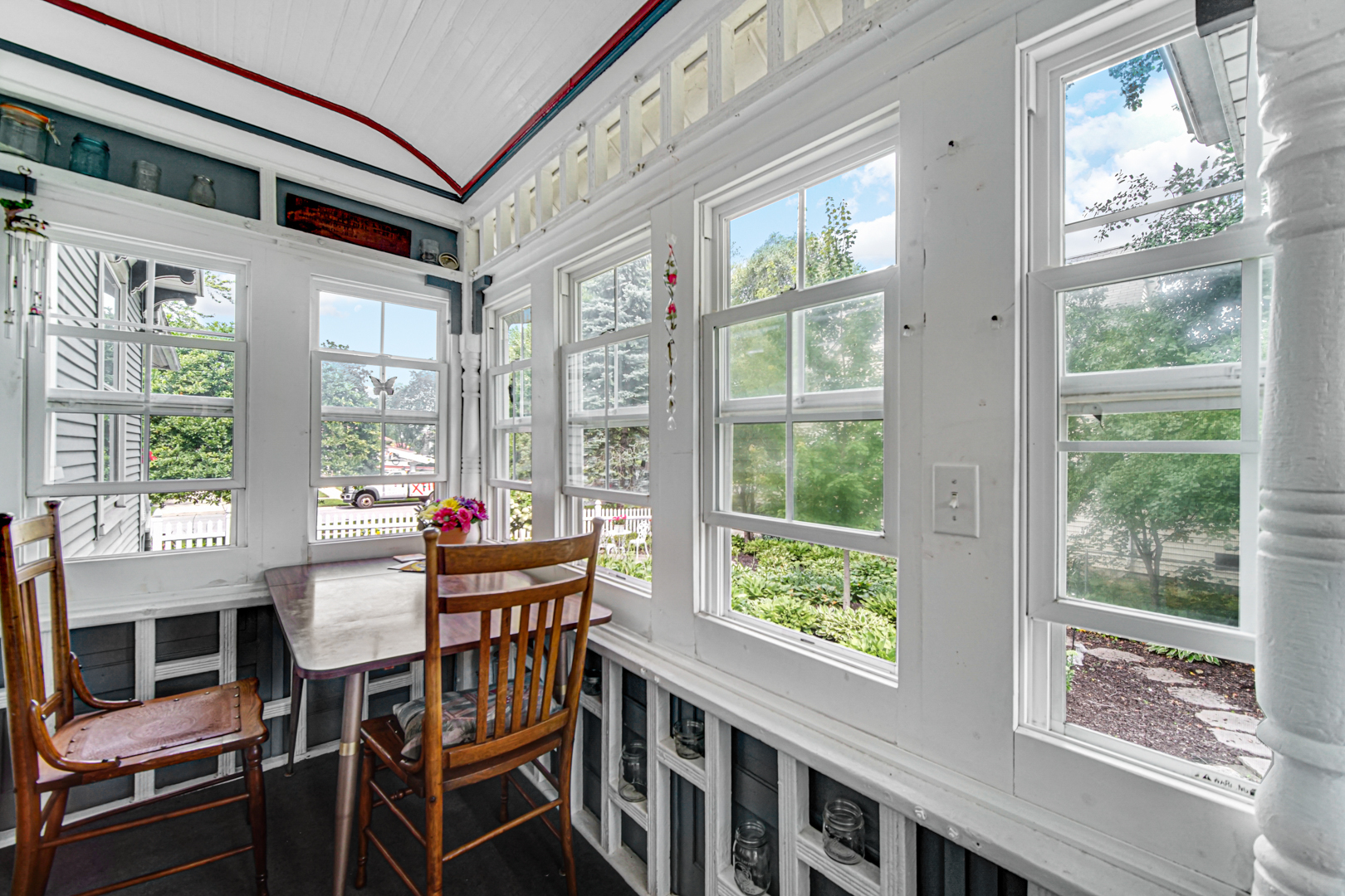 1945 Pine Road Homewood, IL 60430 - Photo 19 of 26 a view of a dining room with furniture large windows and wooden floor