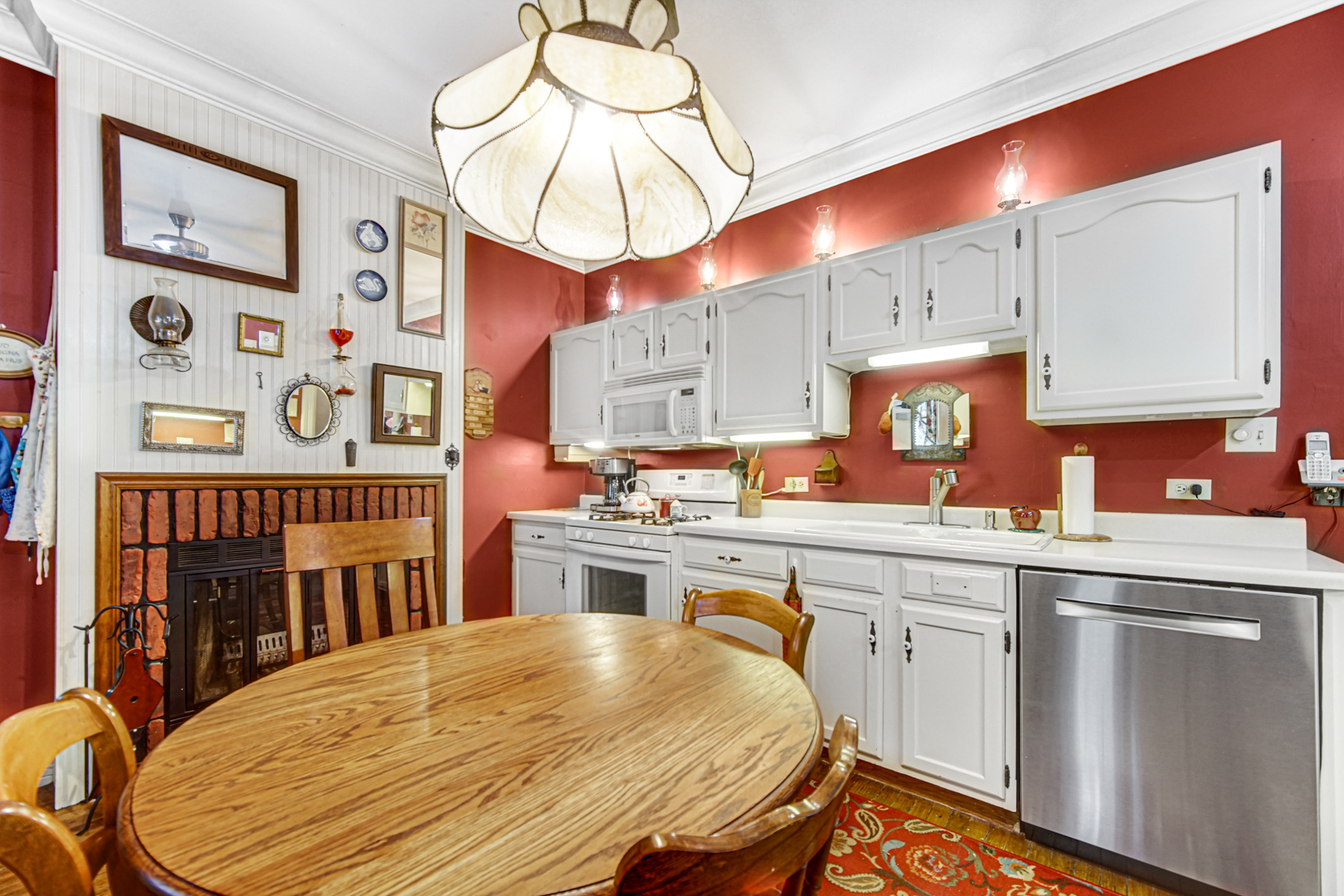 1945 Pine Road Homewood, IL 60430 - Photo 2 of 26 a kitchen with stainless steel appliances a stove a sink dishwasher and cabinets with wooden floor