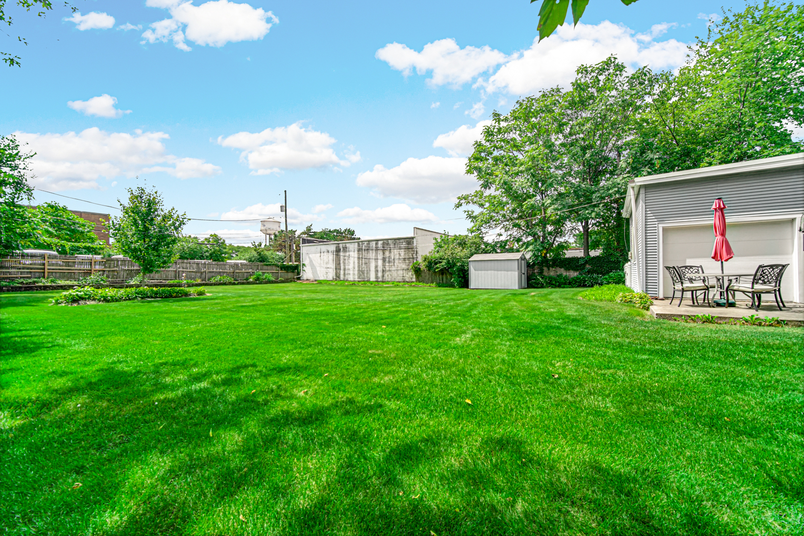 1945 Pine Road Homewood, IL 60430 - Photo 21 of 26 a view of a house with a big yard
