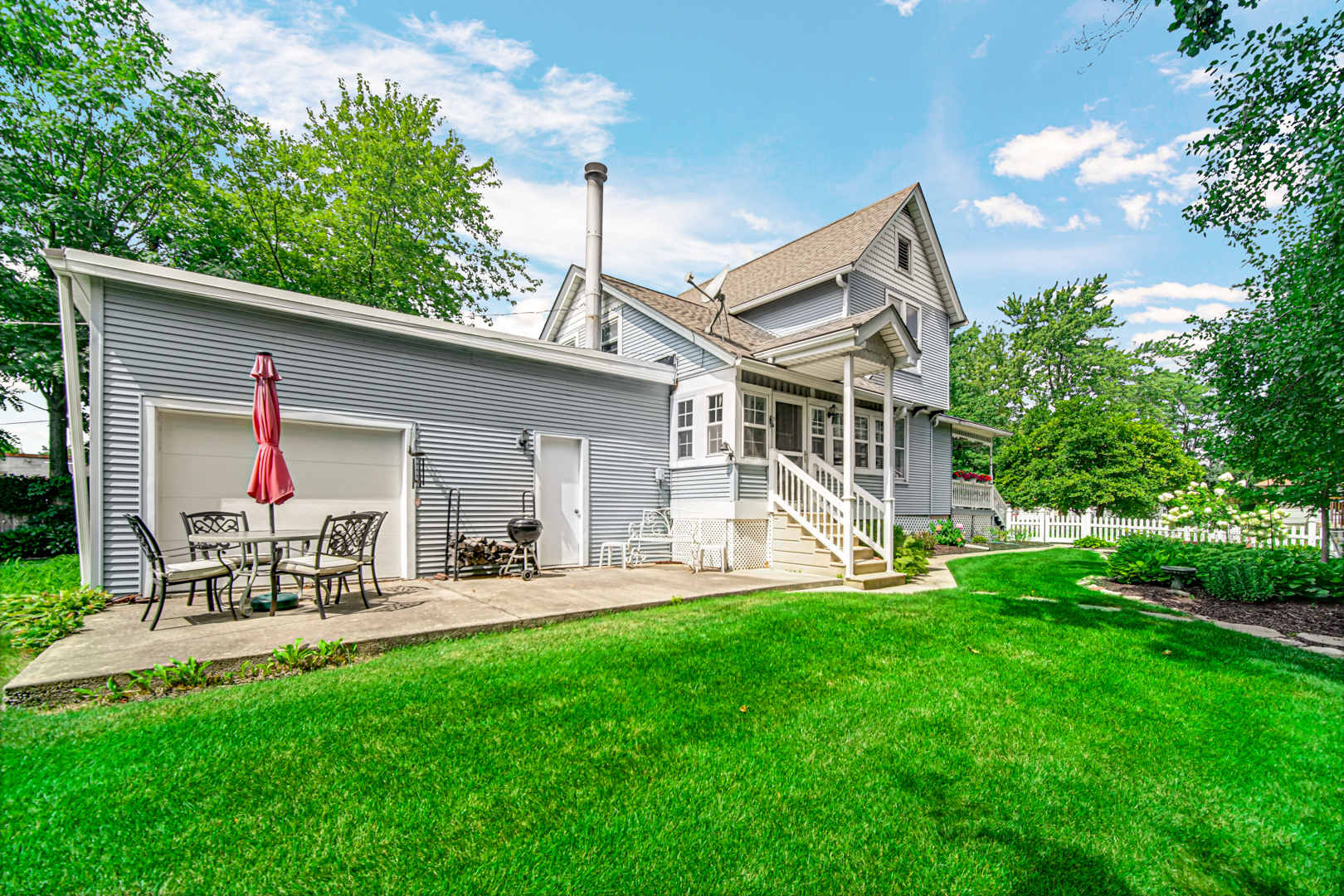 1945 Pine Road Homewood, IL 60430 - Photo 23 of 26 a front view of house with a garden and patio