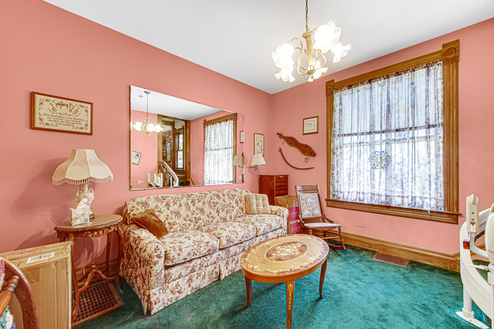 1945 Pine Road Homewood, IL 60430 - Photo 6 of 26 a living room with furniture a window and a chandelier