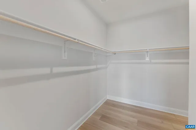a view of an empty walk in closet