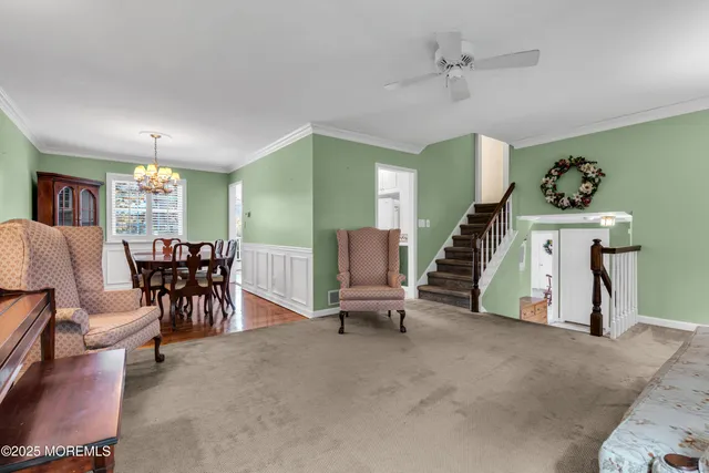 a living room with furniture and a table