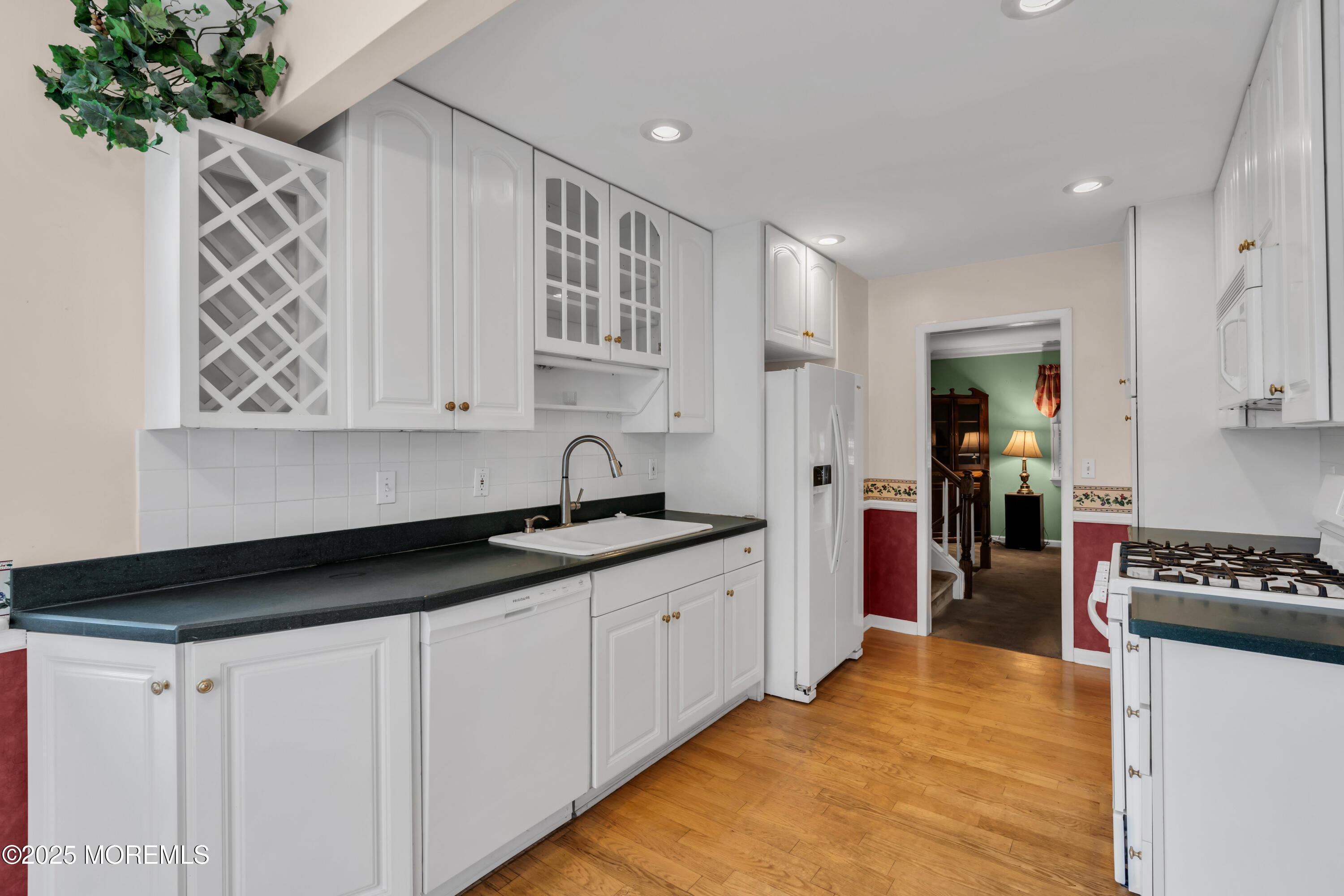 39 Bayberry Lane Middletown, NJ 07748 - Photo 19 of 37 a kitchen with stainless steel appliances granite countertop a stove a sink and a refrigerator