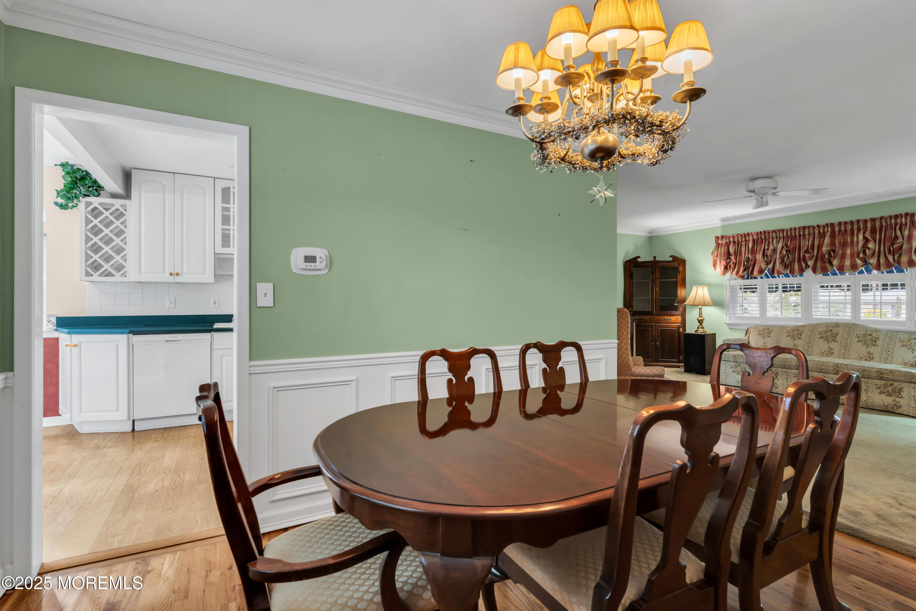 39 Bayberry Lane Middletown, NJ 07748 - Photo 21 of 37 a dining room with furniture and chandelier