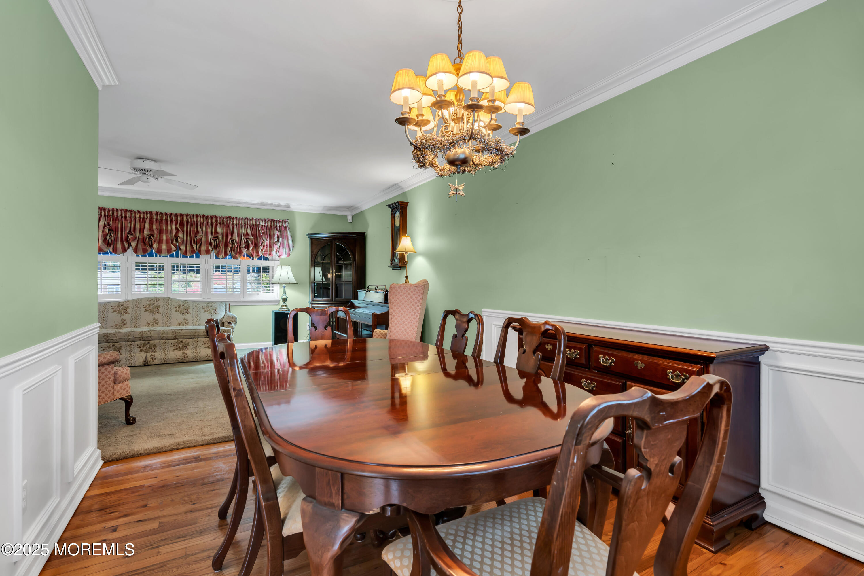 39 Bayberry Lane Middletown, NJ 07748 - Photo 22 of 37 a view of a dining room with furniture and chandelier