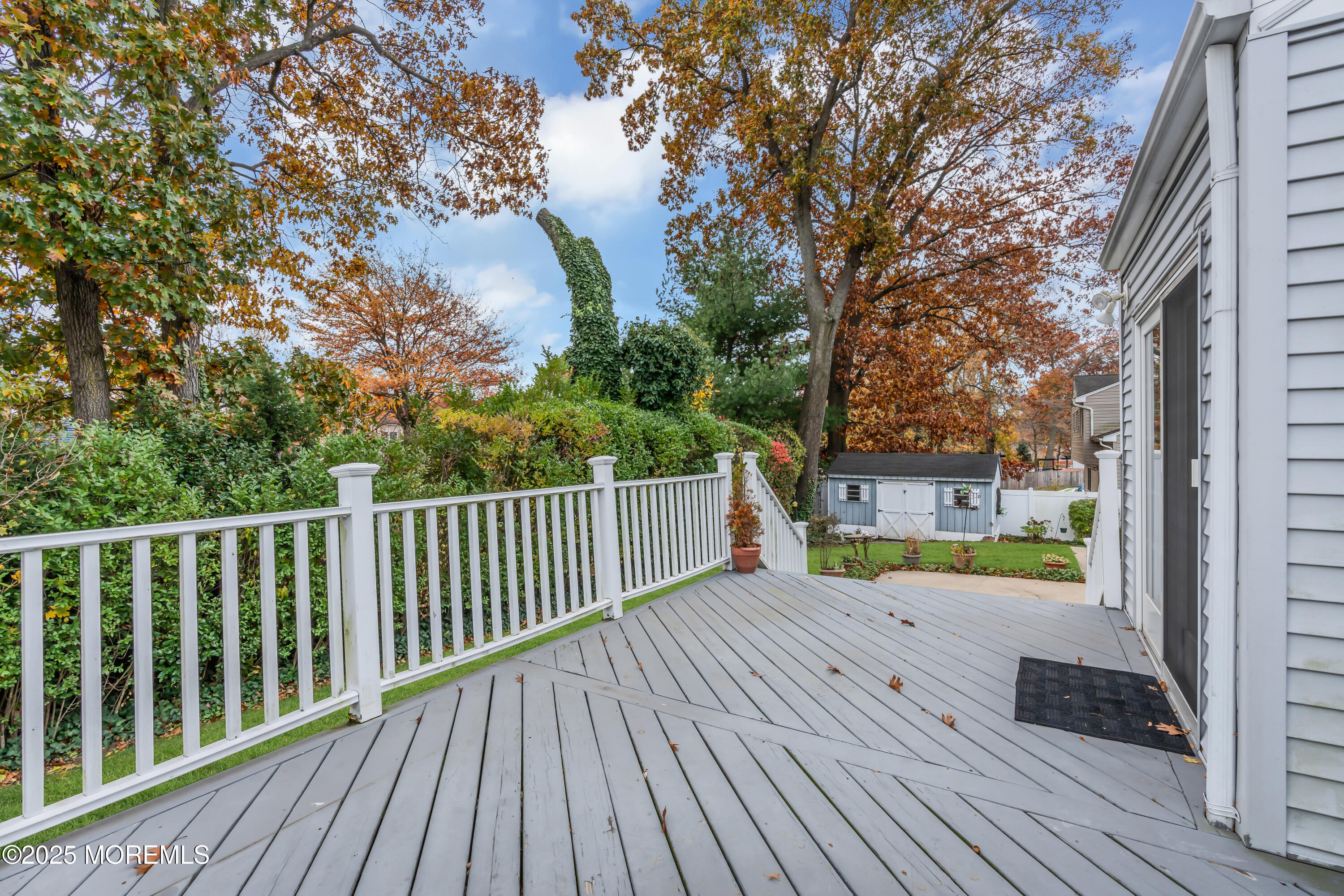 39 Bayberry Lane Middletown, NJ 07748 - Photo 31 of 37 a view of a balcony with wooden floor and fence