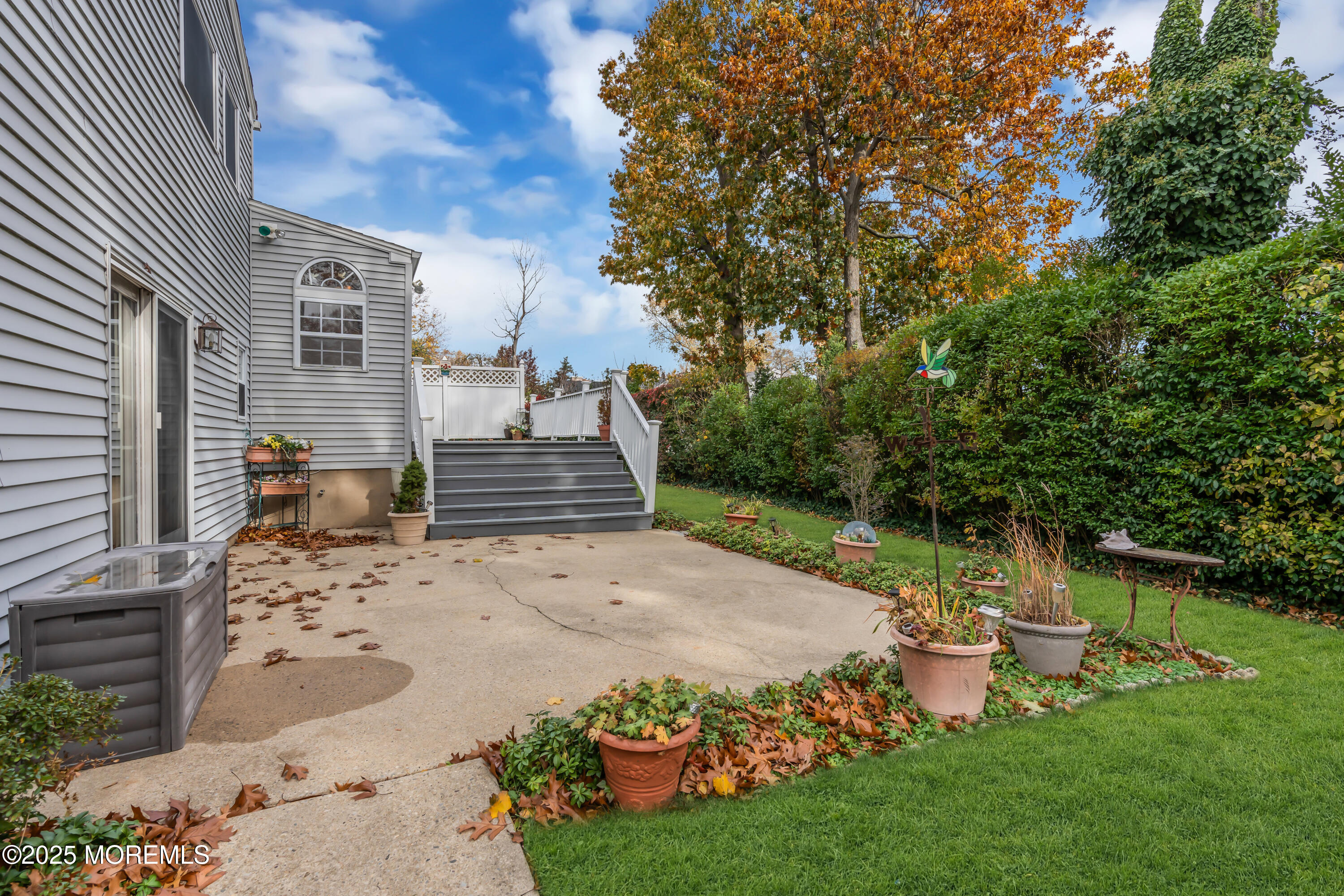 39 Bayberry Lane Middletown, NJ 07748 - Photo 32 of 37 a view of a backyard with sitting area