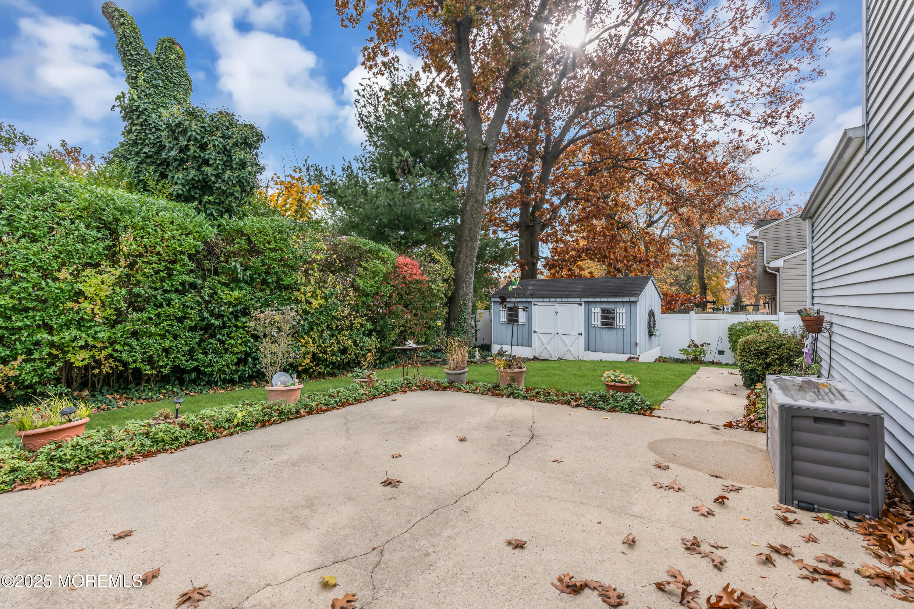 39 Bayberry Lane Middletown, NJ 07748 - Photo 33 of 37 a view of a street with a large trees