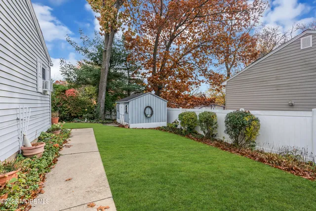 a view of a back yard of the house