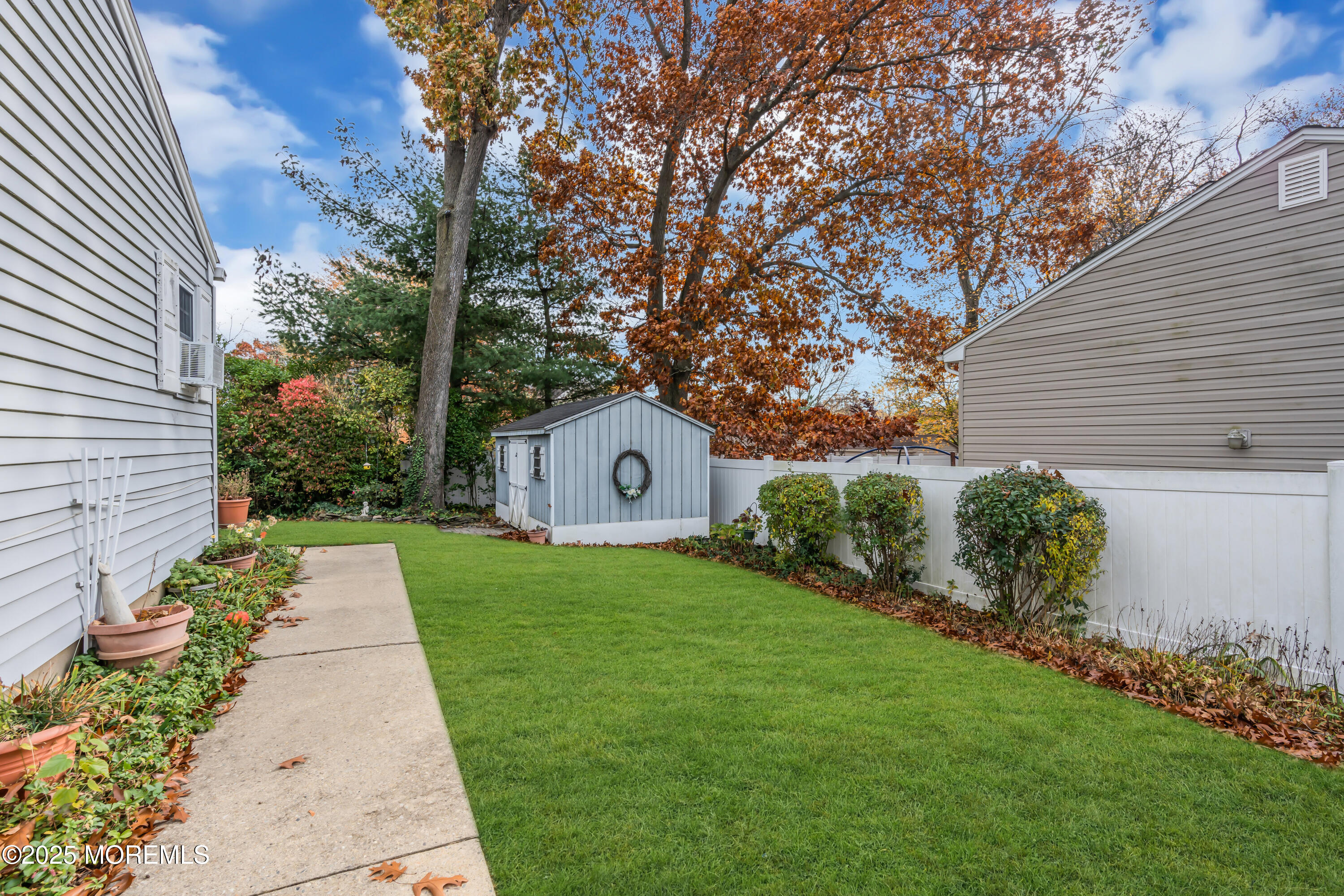 39 Bayberry Lane Middletown, NJ 07748 - Photo 35 of 37 a view of a back yard of the house
