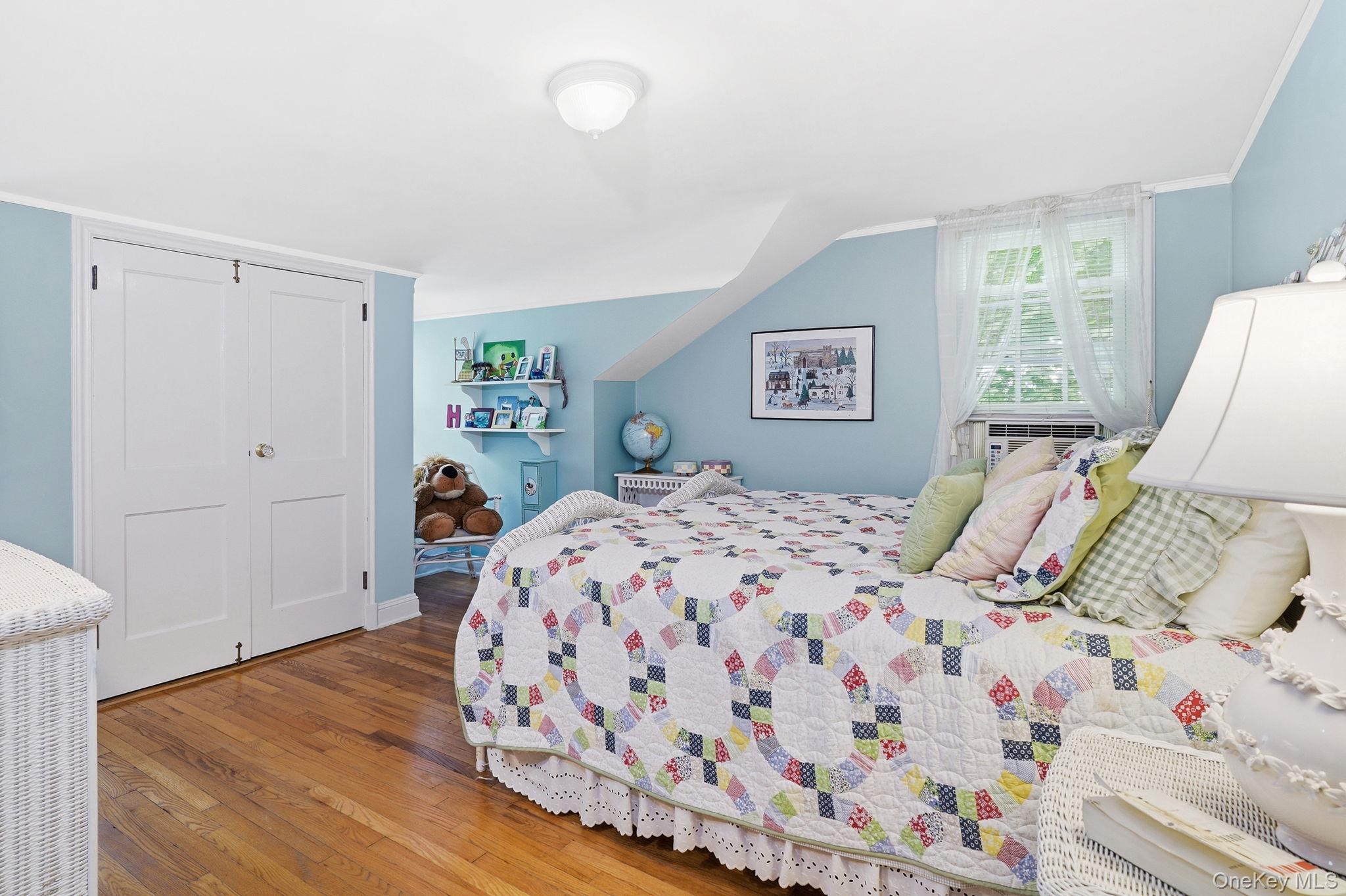 26 Cedarlawn Road Irvington, NY 10533 - Photo 21 of 34 a bedroom with a bed and a window