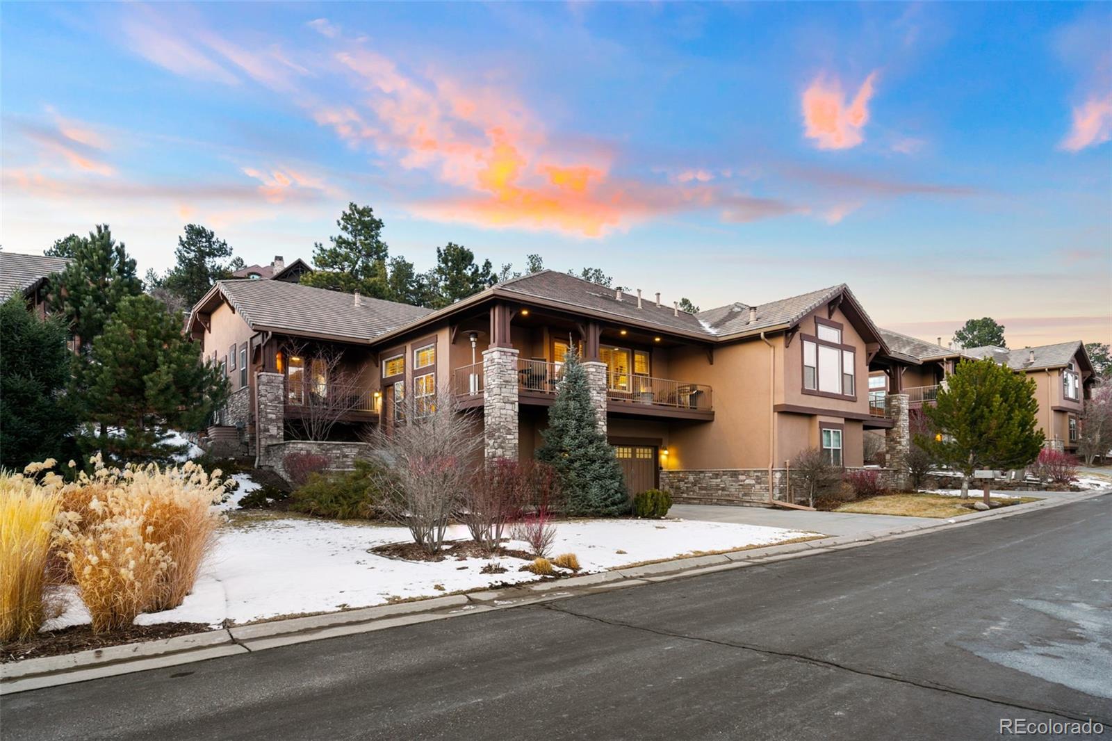 4315 Chateau Ridge Road Castle Rock, CO 80108 - Photo 2 of 26 a front view of a house with a yard