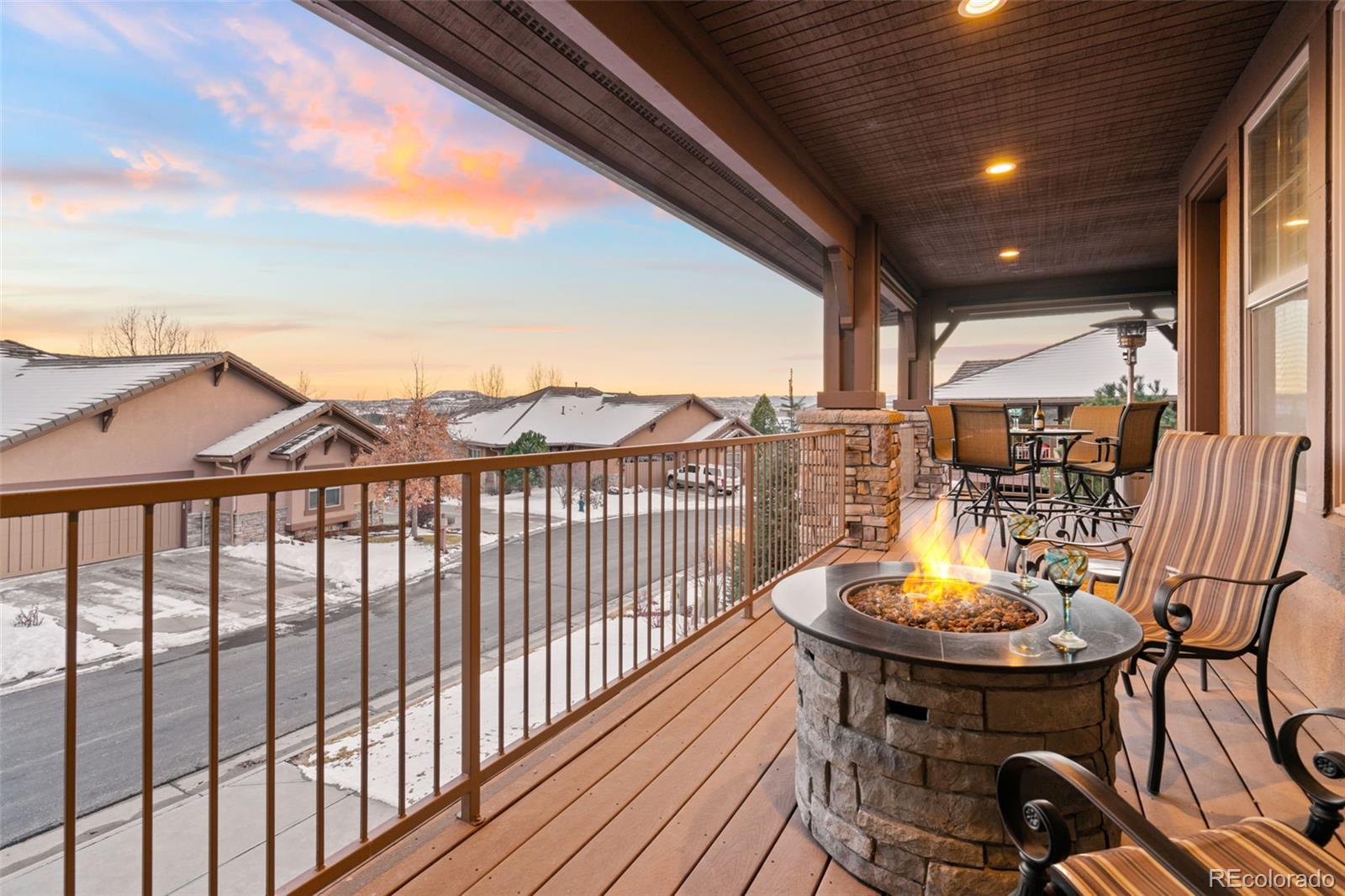 4315 Chateau Ridge Road Castle Rock, CO 80108 - Photo 23 of 26 a view of a chairs and table in the balcony