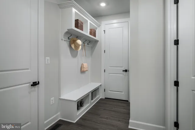 a bathroom with a shower and mirror