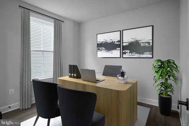 a room with a table and chairs