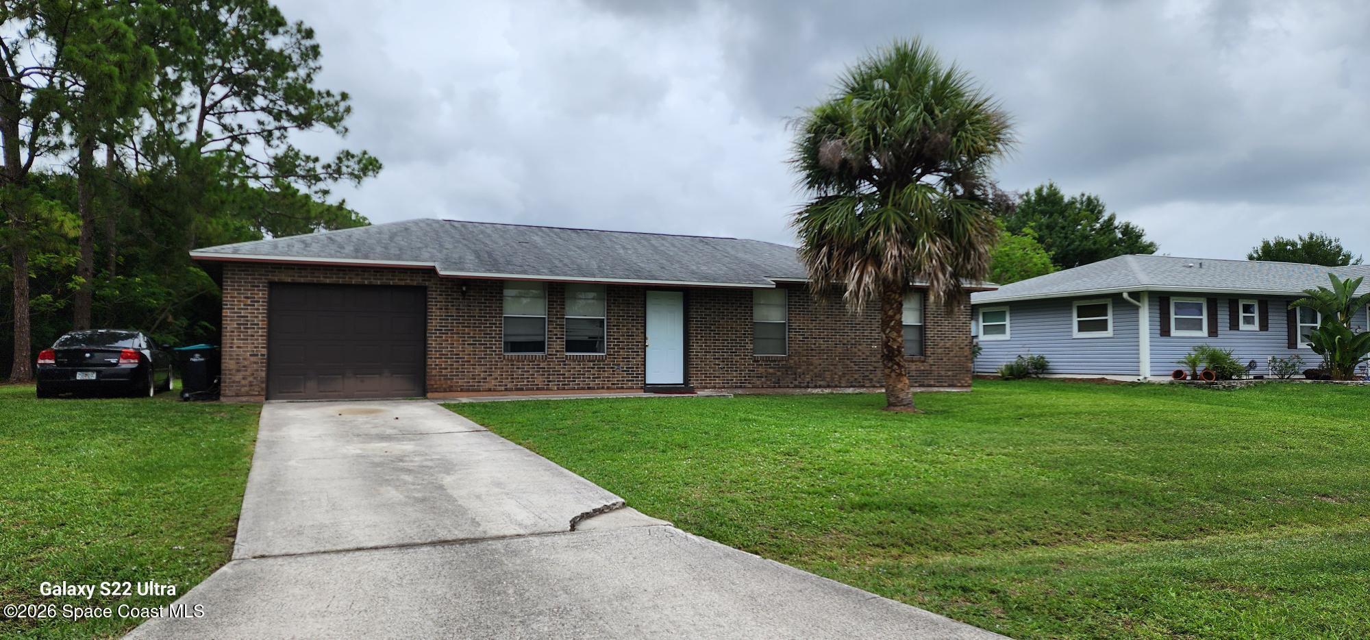839 Custer Street Northwest Palm Bay, FL 32907 - Photo 2 of 4 20250605_140748