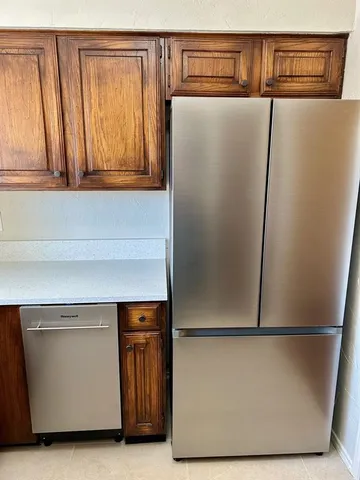 a close view of a refrigerator in kitchen