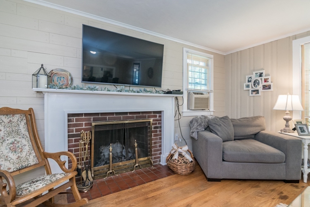 20 Dunton Street Montague, MA 01376 - Photo 17 of 36 a living room with furniture and a fireplace